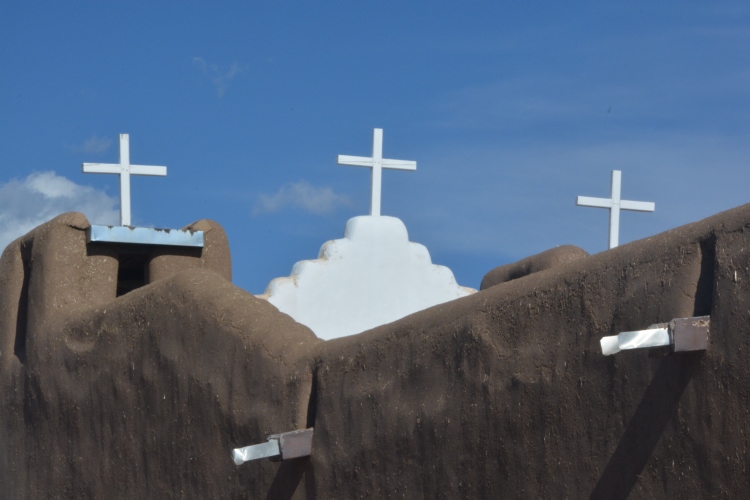 church crosses against sky